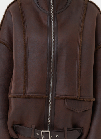 Женская дубленка коричневого цвета 